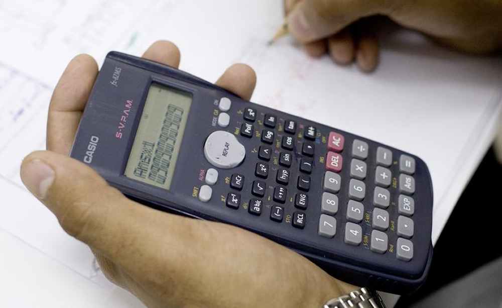 calculator and pencil